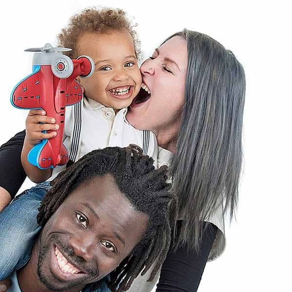Parents and child enjoying a relaxed family portrait session